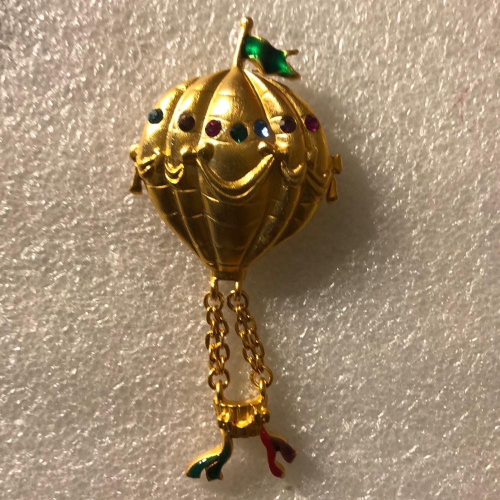 Vintage golden parachute pins with multiple colors beats